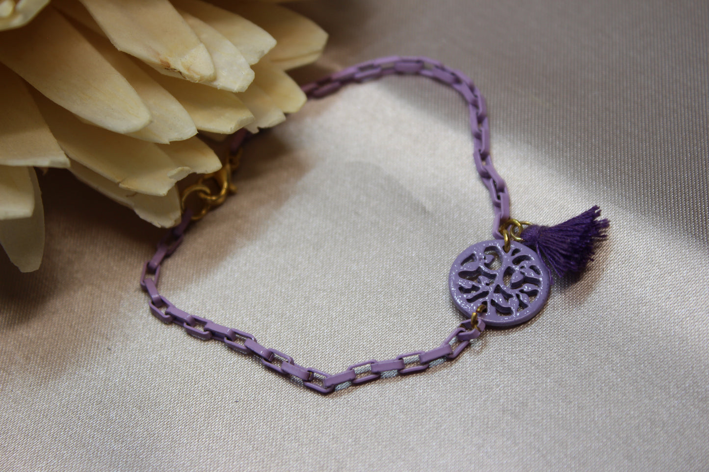 Pulsera cadena morada con dije