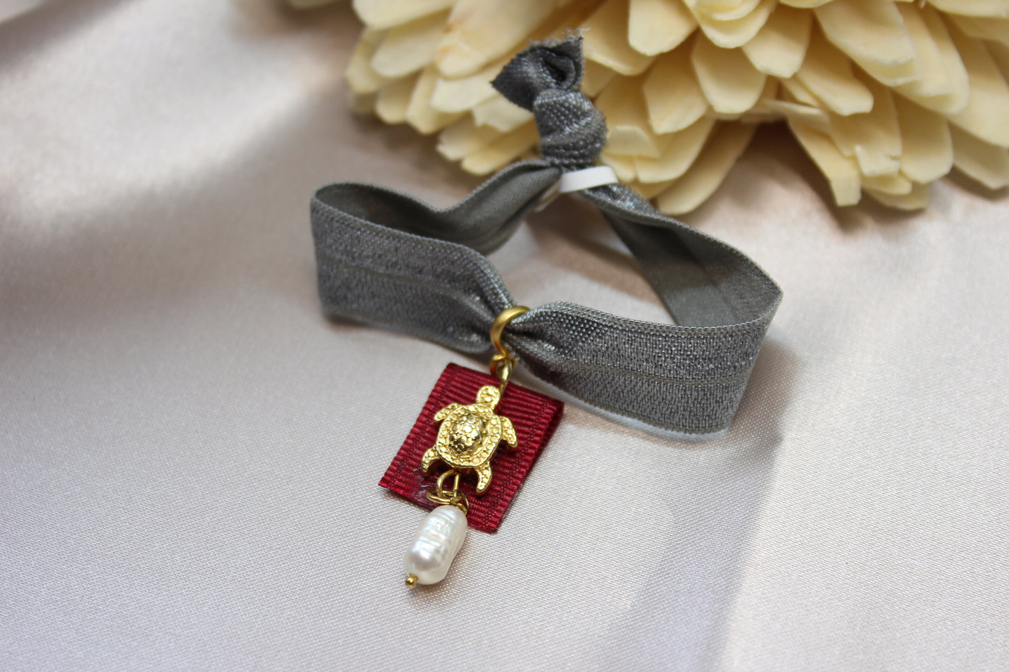 Pulsera elástico dijes