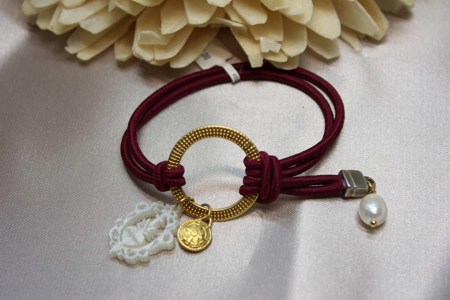 Pulsera liga con Dije CN